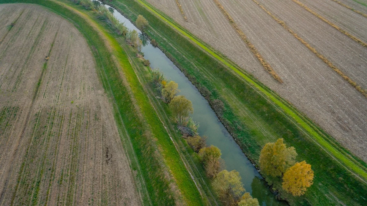 aerial shot of waterway on the farm - farm auction prep list